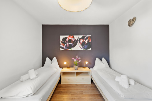 Schlafzimmer 1 mit Einzelbetten