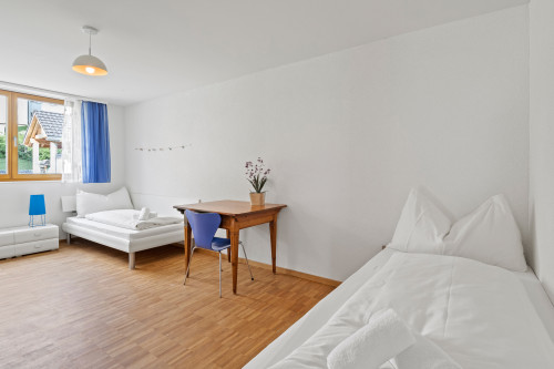 Schlafzimmer 1 mit drei Einzelbetten